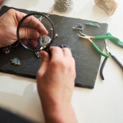 jeweler-checking-the-quality-of-his-new-jewelry-it-2024-10-18-08-39-51-utc-w1080-h1920